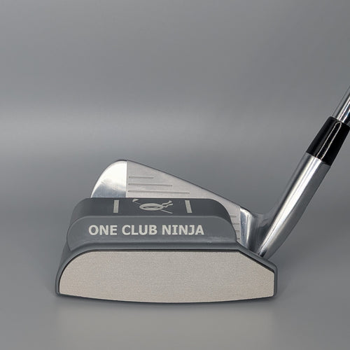Obsidian One Club Ninja putter attachment clipped to the face of a 7-iron