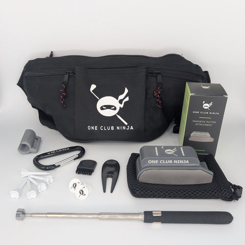 The One Club Kit flat lay with the Obsidian putter attachment, waist bag, telescoping alignment stick, and accessories