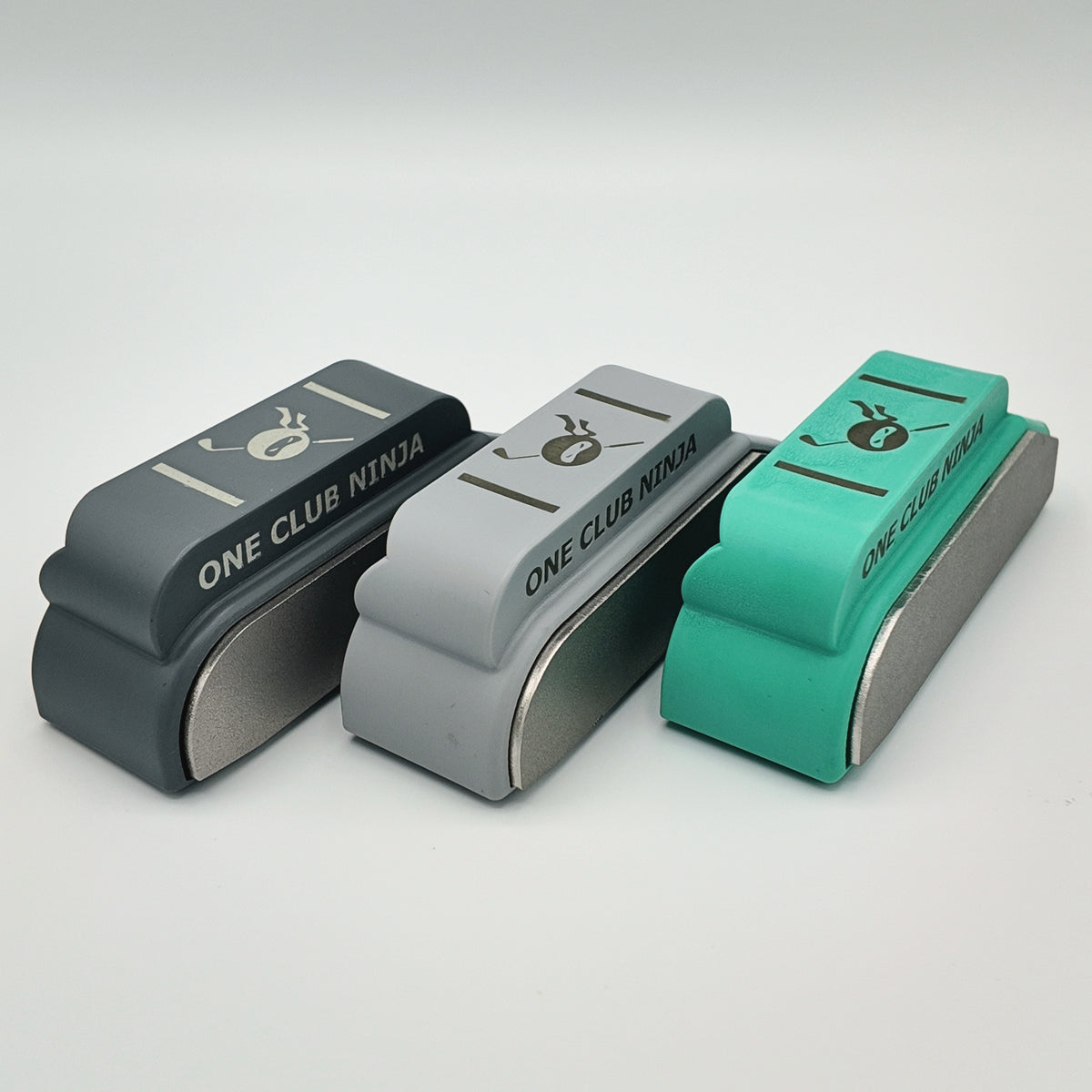 One Club Ninja putter attachments in Obsidian, Light Gray, and Green.